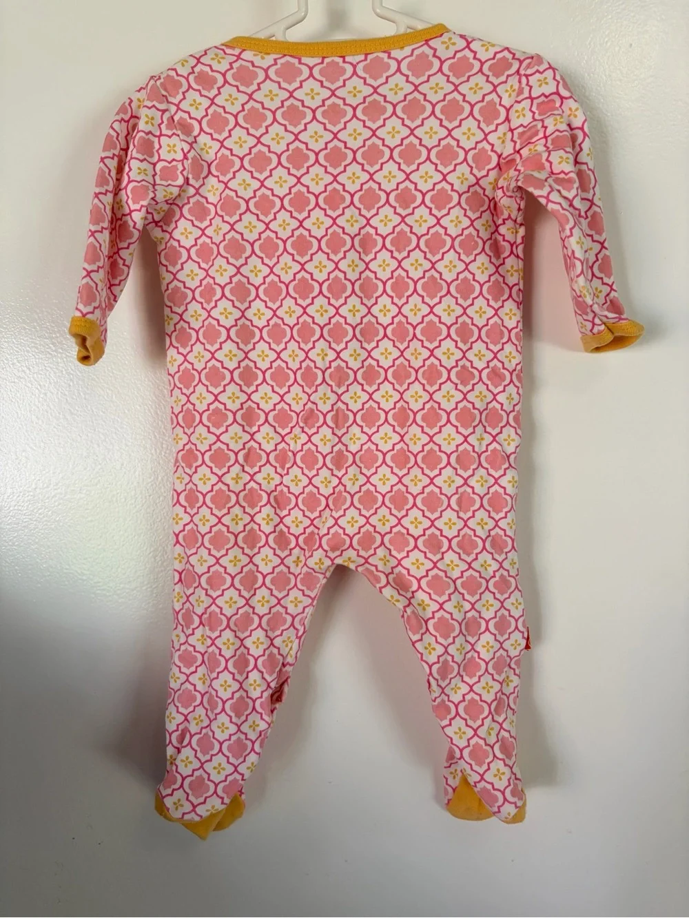 Magnificent Baby Pink Geometric Footed One-Piece with Yellow Trim